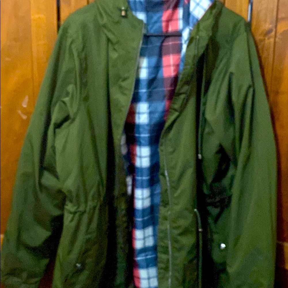Green wind breaker/rain jacket. In great condition